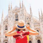A female facing the Milan Cathedral.