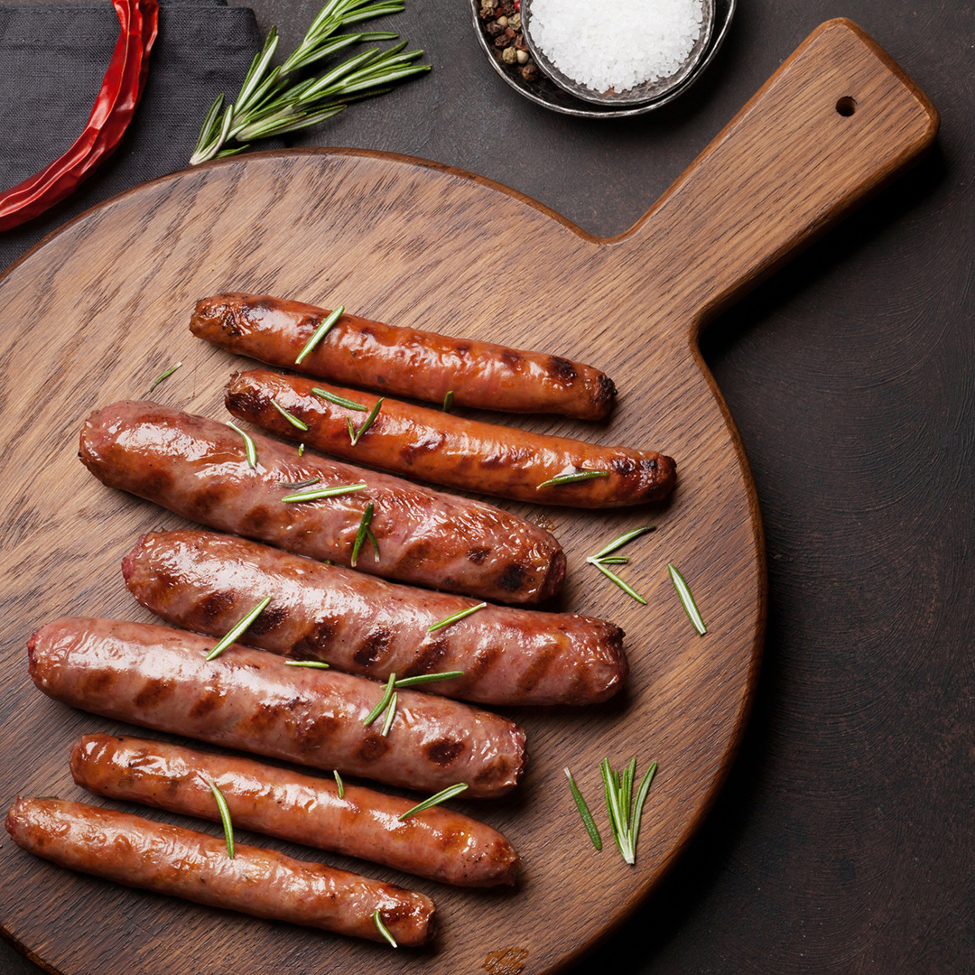 sausages served on a wooden board