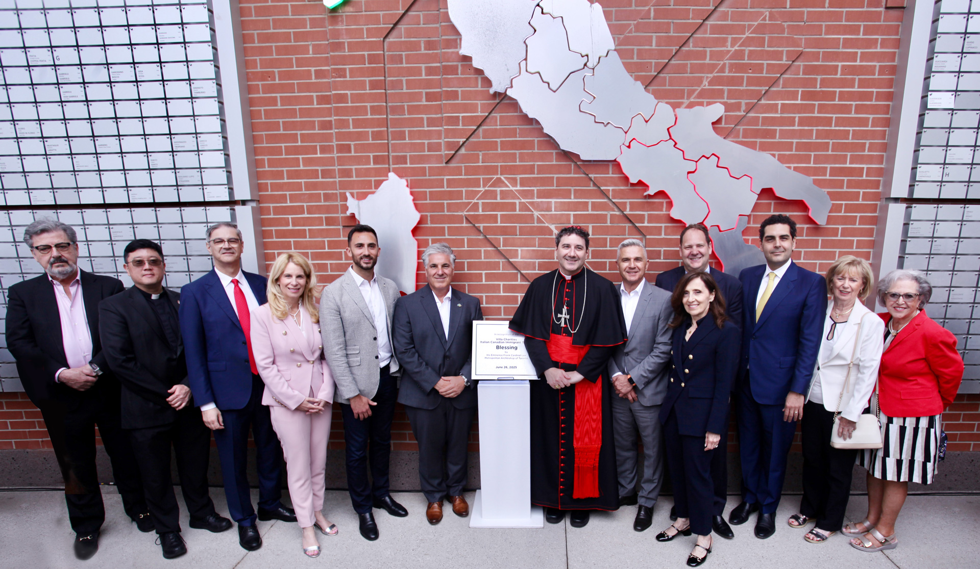 From (L to R) Aldo Cundari, Marketing Executive and Board Director, Villa Charities Foundation; Father Arthur Lee, Priest Secretary, Office of the Archbishop; Luca Zelioli, Consul General of Italy in Toronto; Michelle Cooper, Parliamentary Assistant to the Minister of Finance and MPP for Eglinton-Lawrence; Hon. Stephen Lecce, Ontario Minister for Energy and Mines and MPP for King-Vaughan; Marco DeVuono, President and CEO, Villa Charities Inc; His Eminence, Frank Cardinal Leo, Metropolitan Archbishop of Toronto, Joseph Arcuri, Board Chair, Villa Charities Inc.; Mary Pompili, Vice President, Marketing and Communications, Villa Charities Inc.; Hon. John Zerucelli, Secretary of State (Labour) and MP for Etobicoke North; Vince Gasparro, Parliamentary Secretary to the Secretary of State (Combatting Crime) and MP for Eglinton-Lawrence; Hon. Judy Sgro, MP for Humber River-Black Creek; and Angela Gauthier, Tribute Project donor and Board Chair, Villa Colombo Homes for the Aged Inc.